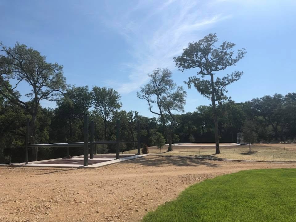 New walker pad graded under the oaks